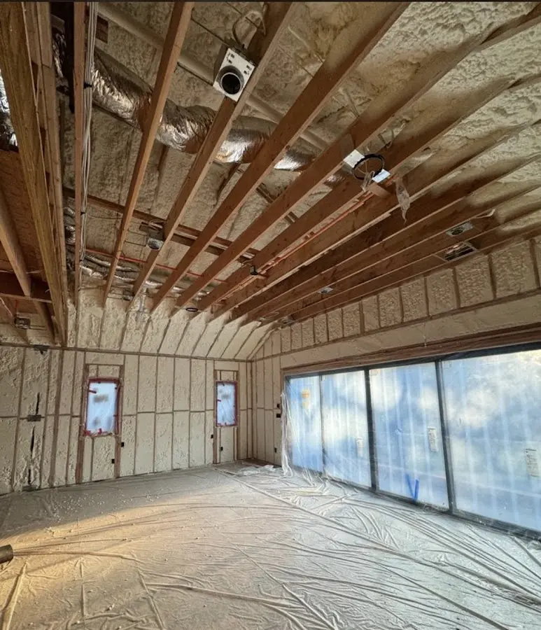 Interior walls and ceiling insulated with spray foam during new construction in Wrightsboro